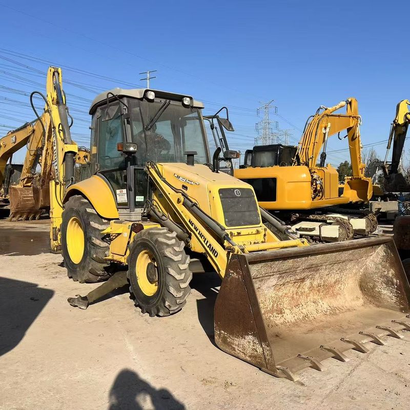 اللون الأصلي New Holland LB85 شاحن الحفر الرابع في حالة جيدة