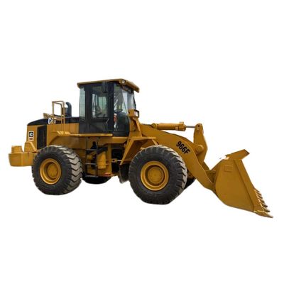 تستخدم جرافة هيدروليكية Caterpillar 966F Wheel Loader معدات البناء